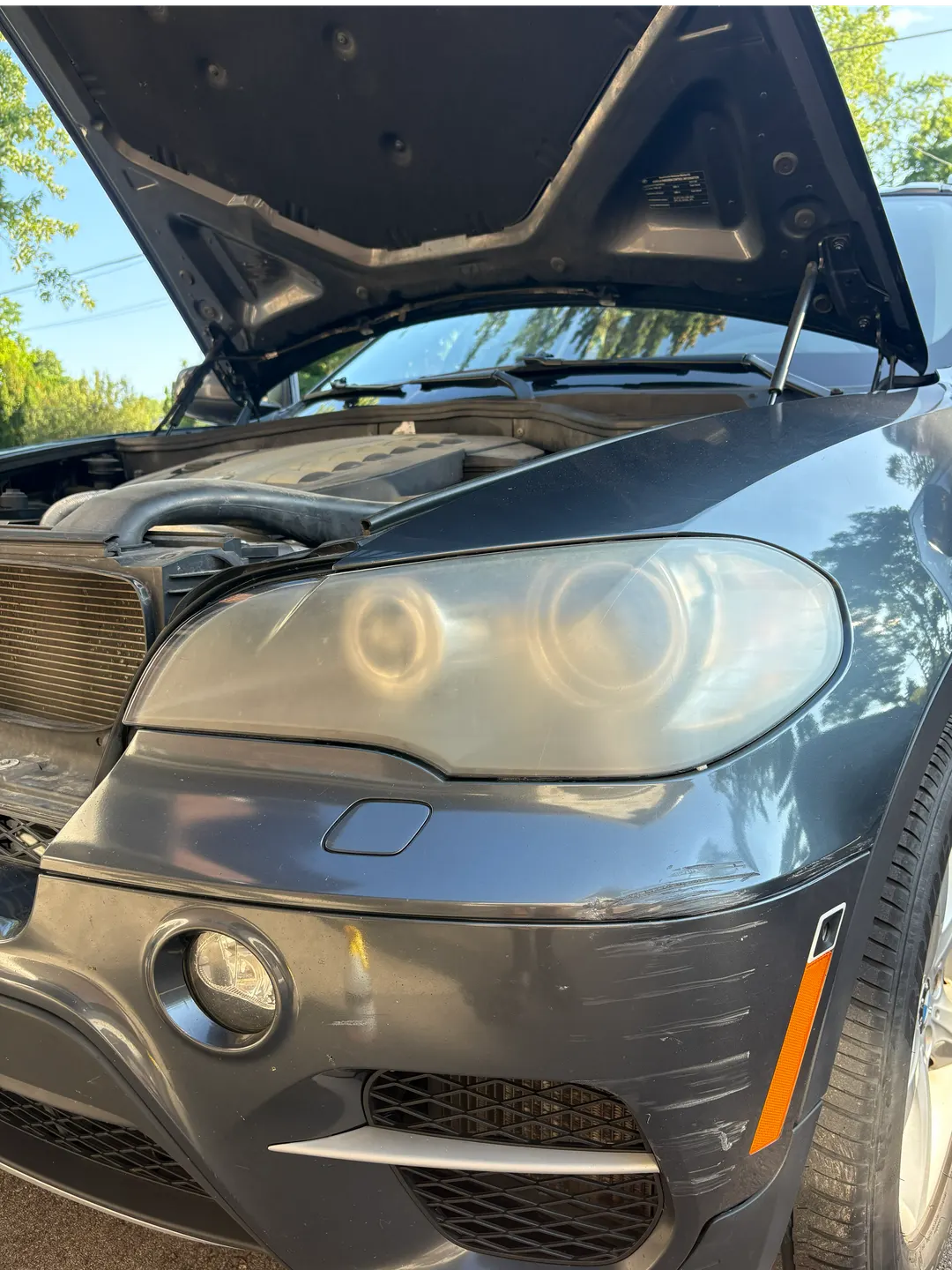 Before headlight restoration — Signature Car Care